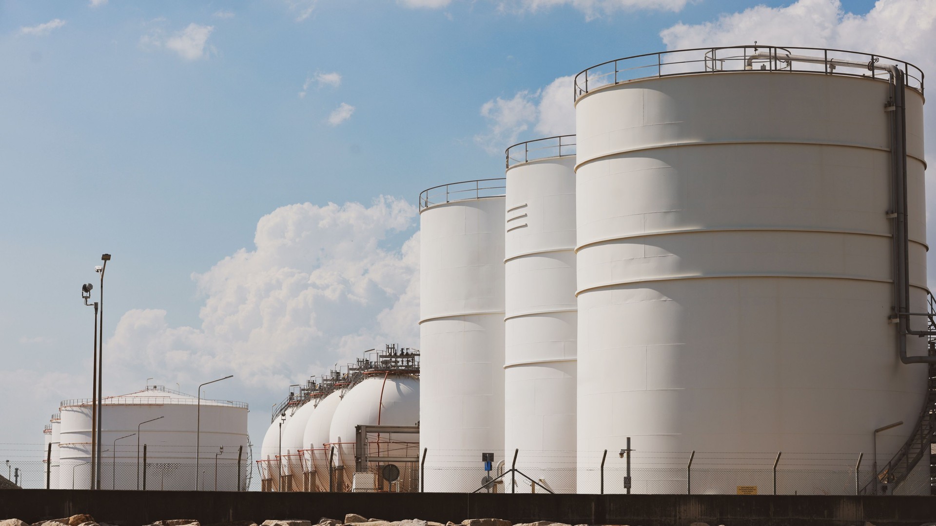 Oil and gas refinery storage tank. Industrial structures tanks